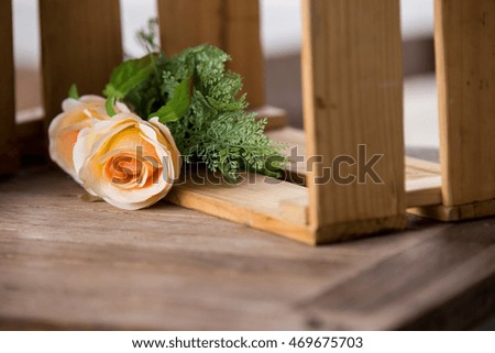 pastel roses on vintage  wood background, free copy space