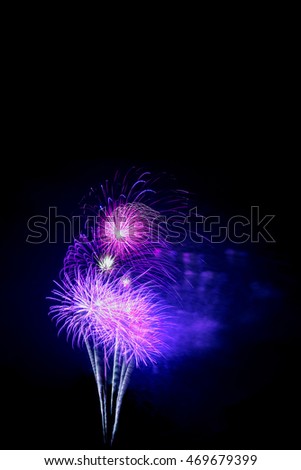pupple and blue fireworks -  beautiful colorful firework isolated display for celebration happy new year and merry christmas on black isolated background