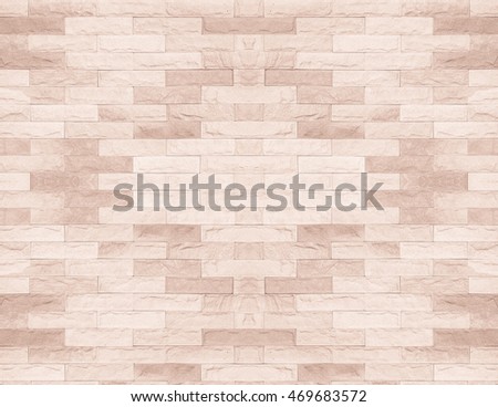 Tiled brick wall in light sepia beige black white tone texture background for interiors design 