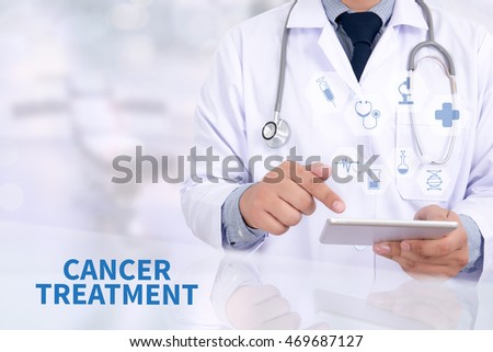 CANCER TREATMENT Medicine doctor working with computer interface as medical