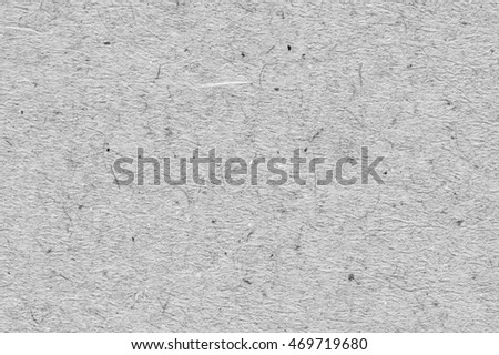 Gray textured paper background.