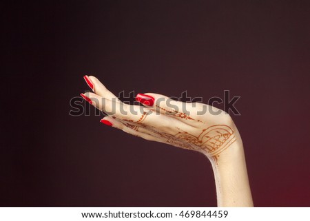Woman Hands with mehndi