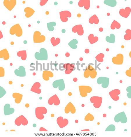 Seamless pattern with colorful hearts and dots on a white background. Vector repeating texture.