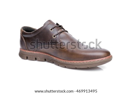 brown leather shoes isolated on a white, top view