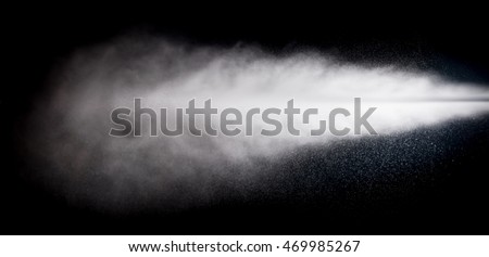 water spray of high pressure water jet on black background Royalty-Free Stock Photo #469985267