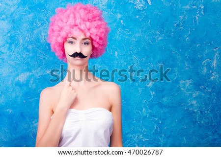 Comic image of female / women / adult with pink wig and black mustache on blue background