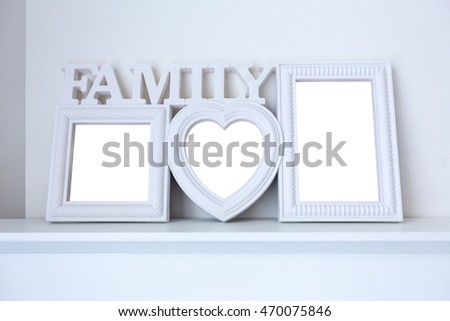 white ceramic photo frame of family