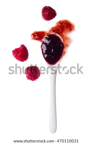 Spoon of jam with berries. Fragrant raspberry. View from the top Royalty-Free Stock Photo #470110031