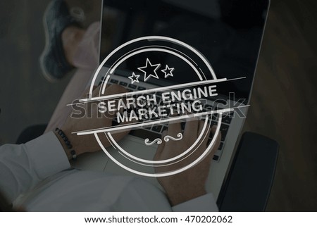 People Using Laptop and SEARCH ENGINE MARKETING Concept