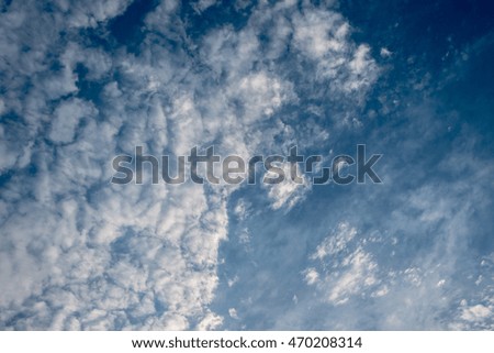Soft focus Blue and cloudy sky background with white clouds