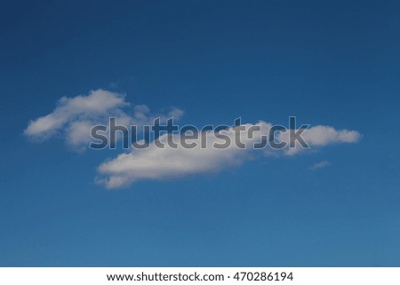 White clouds on a blue sky. Selective focus.