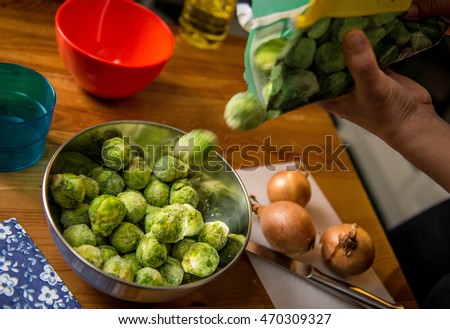 Deep-frozen brussels sprouts in a bowl.