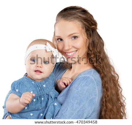 mother hugs a young child