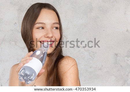 picture of beautiful woman with bottle of water