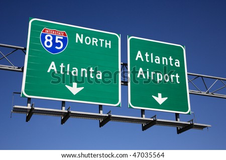 Freeway signs directing drivers to the Atlanta airport. Horizontal shot. Royalty-Free Stock Photo #47035564