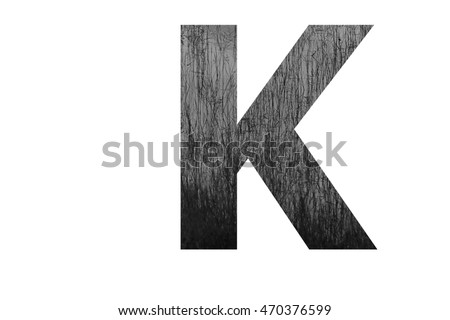 The letter "K" with plantation swamp (black and white) insided