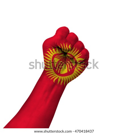 Hand making victory sign, kyrgyzstan painted with flag as symbol of victory, resistance, fight, power, protest, success - isolated on white background