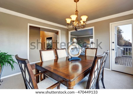 Open floor plan dining area with exit to walkout wooden deck. Northwest, USA