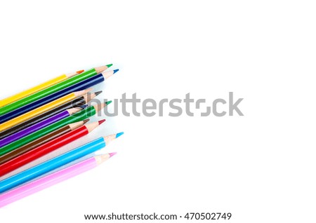 Various colour pencils isolated on white. Bunch of assorted pencils in rainbow arrangement. Back to school and creativity concept. Office and education background