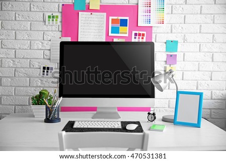 Stylish bright workplace of vivid person