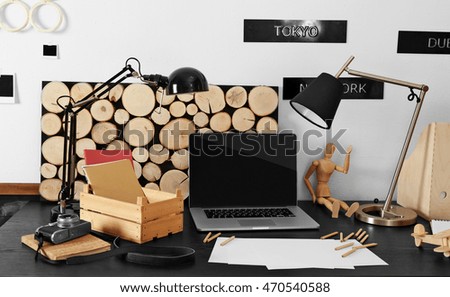 Desktop of creative person with different items indoors