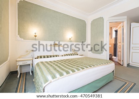 Interior of luxury double bed hotel room 