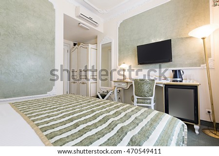 Interior of luxury double bed hotel room 