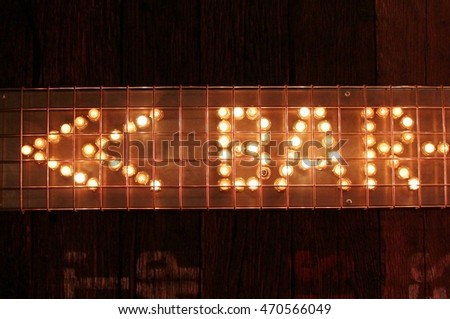 Bar sign lights with arrow stock, photo, photograph, picture, image