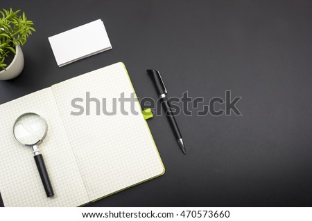 Business card blank, notepad, flower and pen at office desk table top view. Corporate stationery branding mock-up