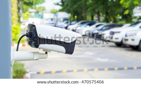 Security equipment concept - CCTV camera video surveillance on car parking guardhouse safety system area control