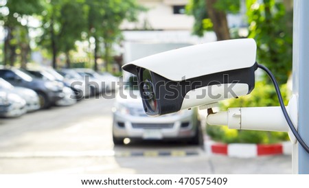 Security equipment concept - CCTV camera video surveillance on car parking guardhouse safety system area control