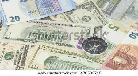 Compass on banknote for financial direction,concept of business planning and finance