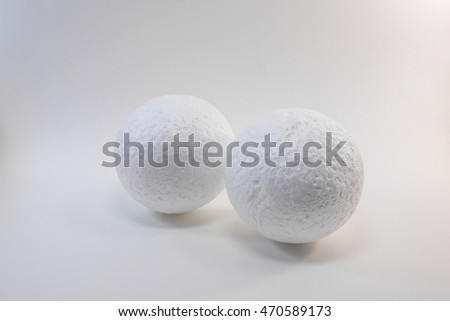 white blank styrofoam balls on white background