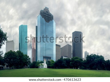  Church in Sam Houston Park against the backdrop of downtown skyscrapers