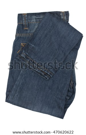 Folded blue jeans isolated on white background