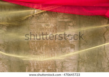 Close up the fabric colorful color for cover on a tree with religious belief in thailand