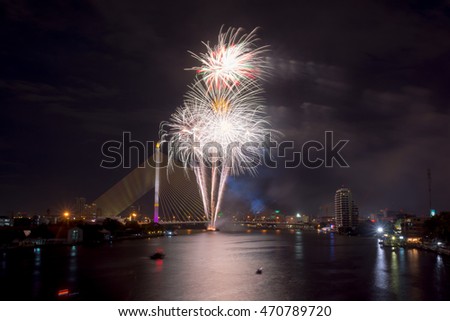 Fireworks under the bridge at night