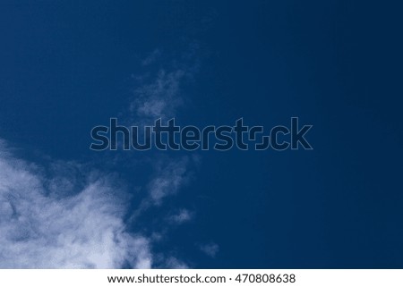 White clouds on a blue sky. Selective focus.