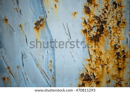 Texture of rusty metal with peeling paint. Rusty background.