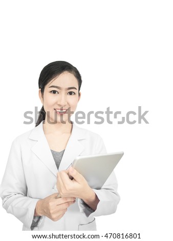 healthcare, profession, stomatology and medicine concept:smiling woman young aged doctor hand holding blur tablet shows a list of patients. over blur medical office background