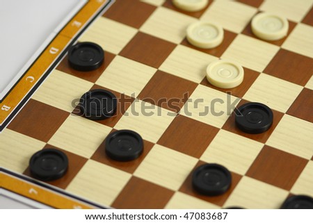A game of checkers or draughts