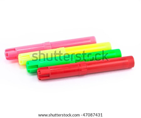 Four highlighter marker pens isolated on white background