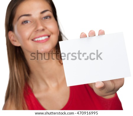 Smiling business woman handing a blank business card 