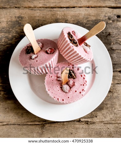  Three  Homemade Strawberry Ice cream on white plate 