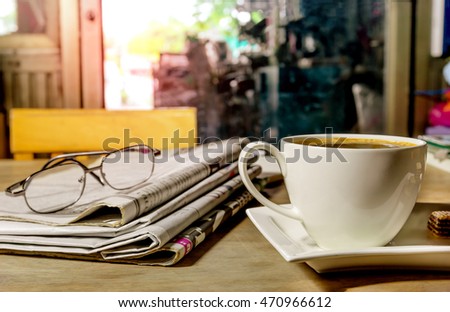 coffee cup with newspaper