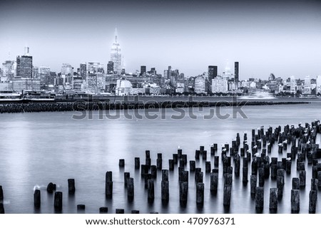 Midtown Manhattan at twilight as seen from the other side of Hudson river.