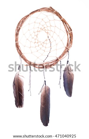Dreamcatcher with a crow's feather on a white background Royalty-Free Stock Photo #471040925