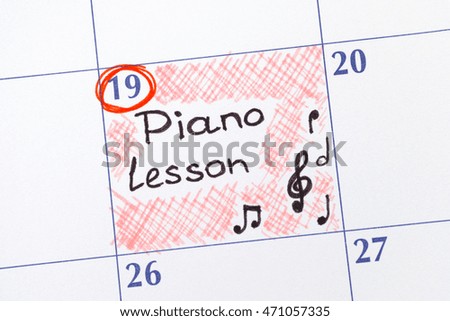 Reminder Piano Lesson in calendar. Close-up.