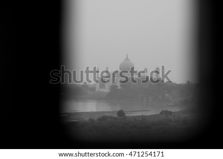 foggy landscape of taj mahal with black abstract pattern as black and white picture
