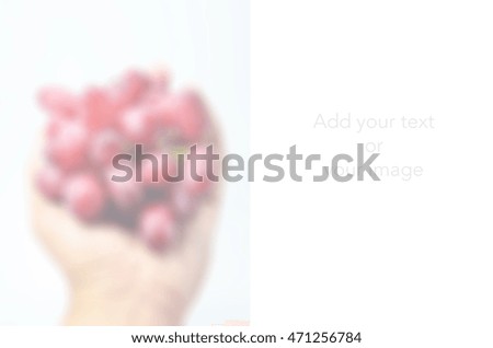 Blurred abstract background of Men holding grapes
